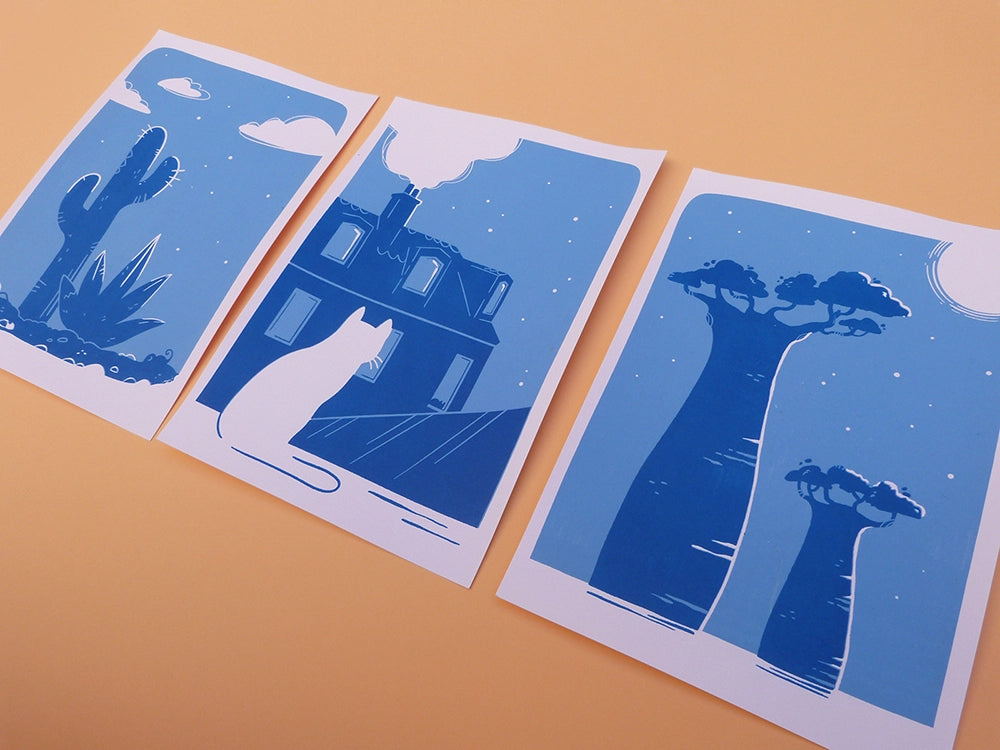 Impressions en sérigraphie artisanale. Paysages nocturnes du désert, de baobabs de Madagascar, et d'un chat sur les toits de Paris.