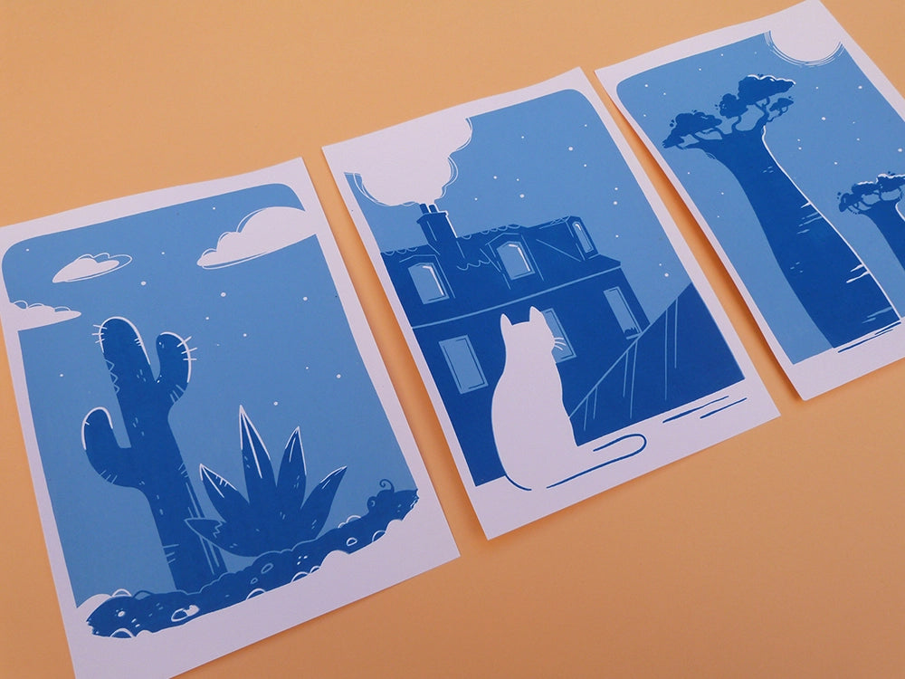 Impressions en sérigraphie artisanale. Paysages nocturnes du désert, de baobabs de Madagascar, et d'un chat sur les toits de Paris.