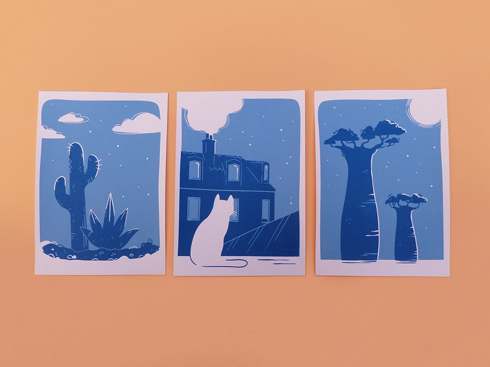 Impressions en sérigraphie artisanale. Paysages nocturnes du désert, de baobabs de Madagascar, et d'un chat sur les toits de Paris.