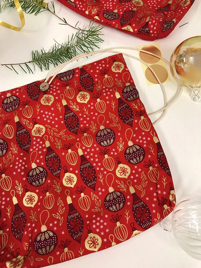 Pochette sérigraphiée artisanalement et entièrement faite à la main. Design animaux biscuits trop mignon.